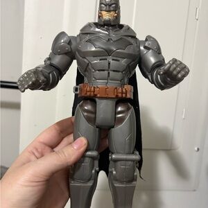 Gray Action Figure with Black Cape
